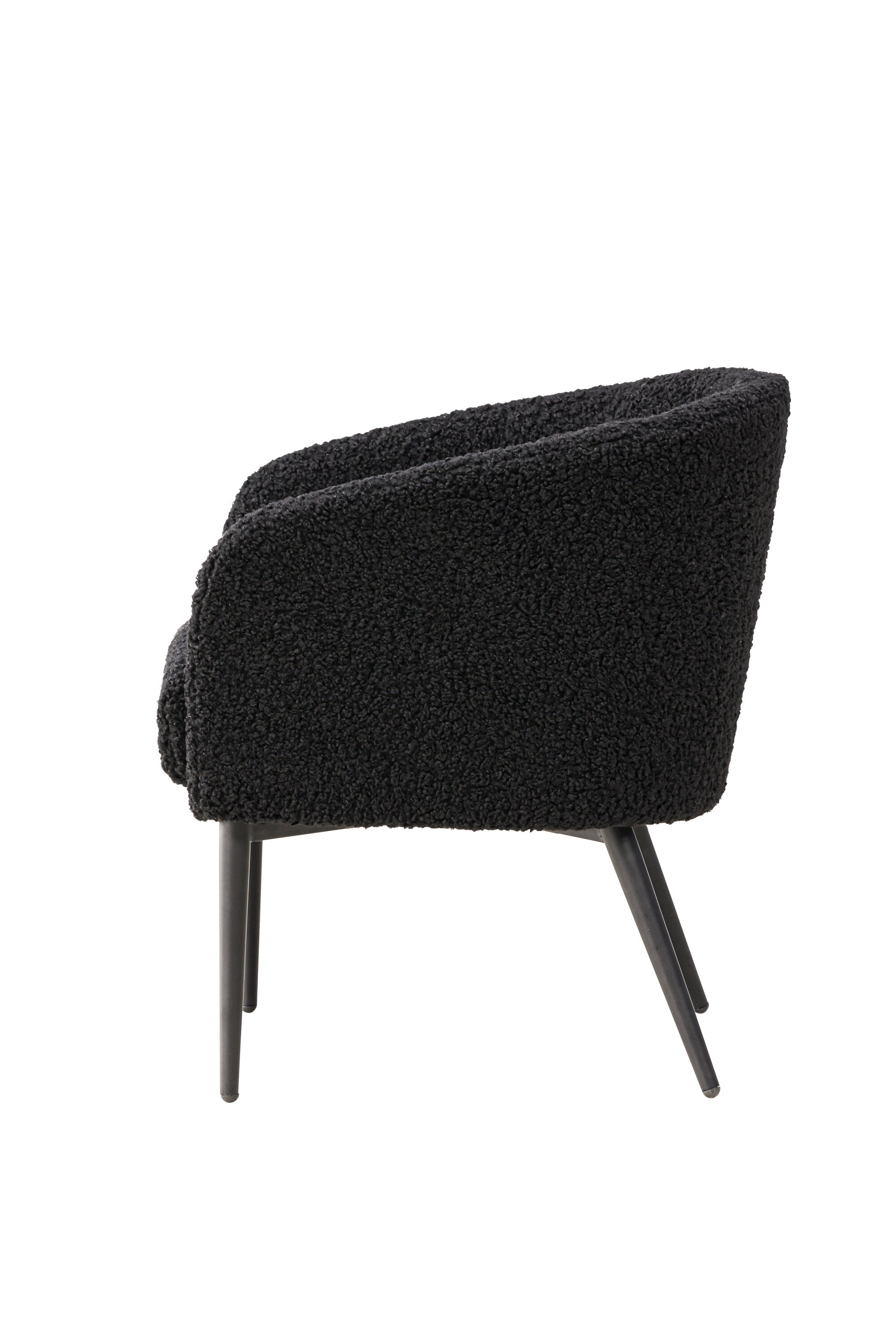 Der Fluffy Sessel von Venture Home: Kuscheliges Teddy-Material trifft auf modernes Design mit schwarzem Metallgestell.