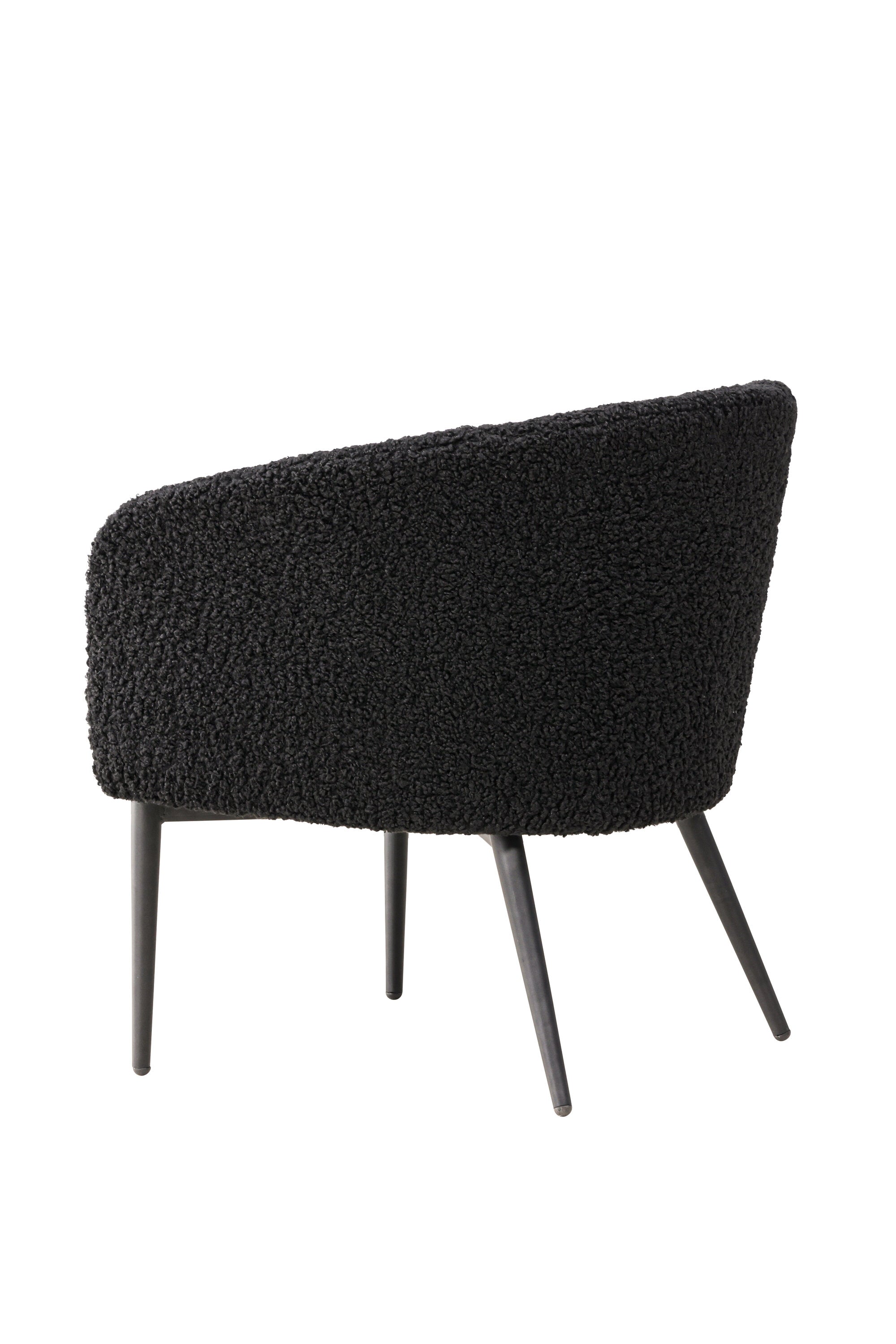 Der Fluffy Sessel von Venture Home: Kuscheliges Teddy-Material trifft auf modernes Design mit schwarzem Metallgestell.