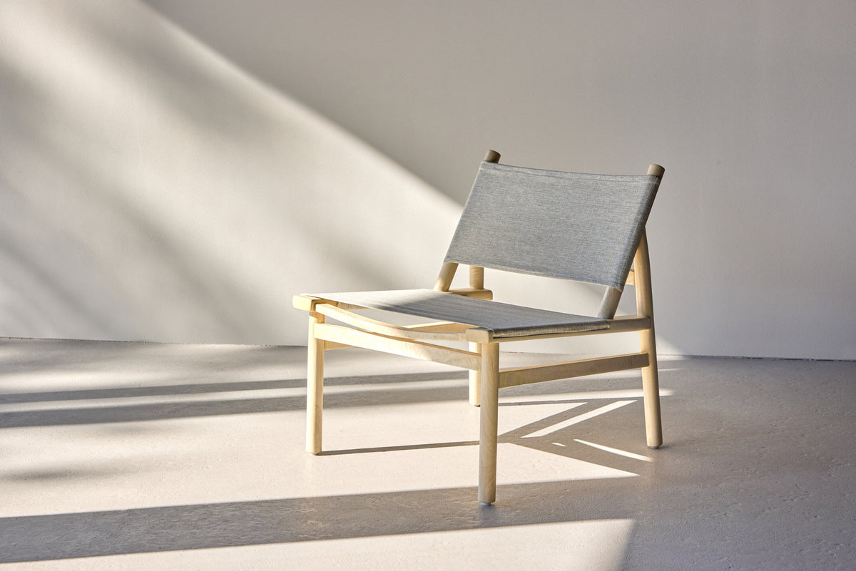 Millo Lounge Stuhl in Natur präsentiert im Onlineshop von KAQTU Design AG. Sessel ist von Venture Home
