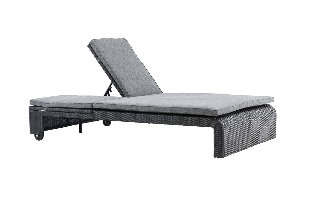 Sonnenliege London von Venture Home in Schwarz mit grauem Kissen und Korbgeflecht