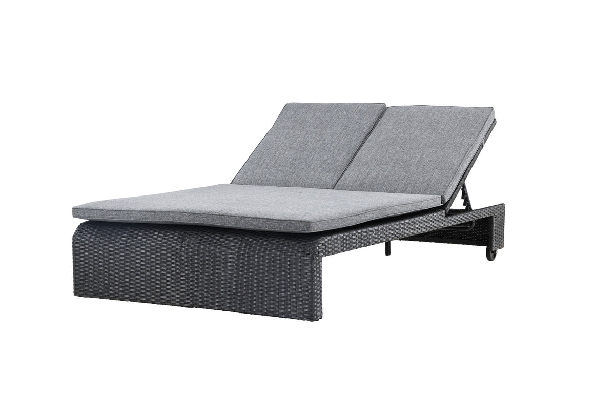 Sonnenliege London von Venture Home in Schwarz mit grauem Kissen und Korbgeflecht