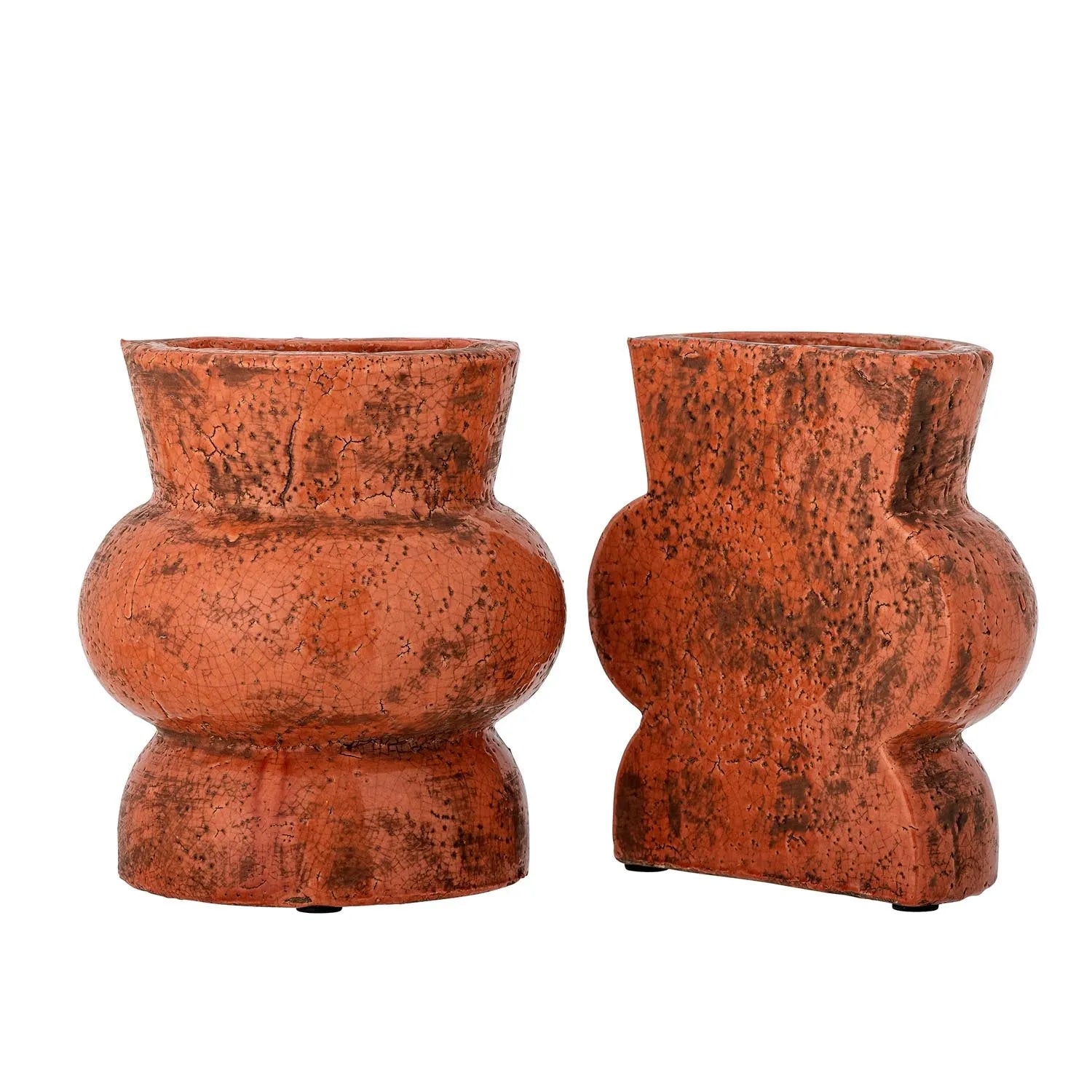 Die Maiza Buchstütze: Terrakotta-Design in warmen Orangetönen, vereint Funktion und Kunst, ideal für stilvolle Bücherregale.