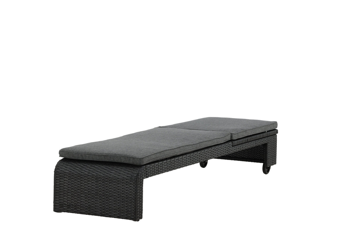 Sonnenliege London von Venture Home in Schwarz mit grauem Kissen und Korbgeflecht