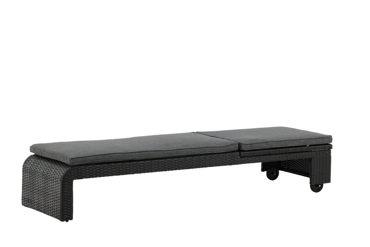 Sonnenliege London von Venture Home in Schwarz mit grauem Kissen und Korbgeflecht