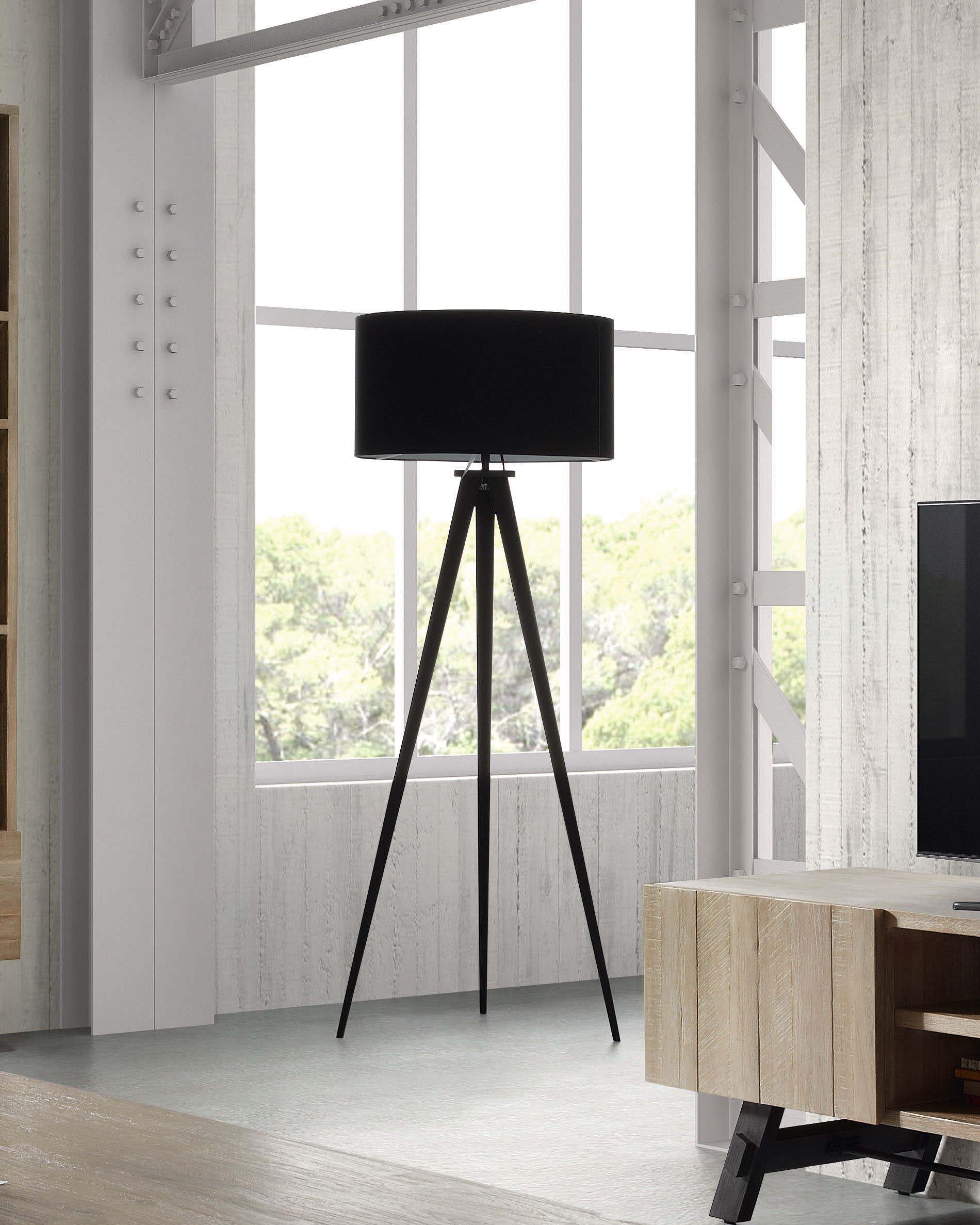 Die Iguazu Stehlampe von Kave Home in Schwarz kombiniert modernes Design mit Funktionalität für stilvolle Beleuchtung.