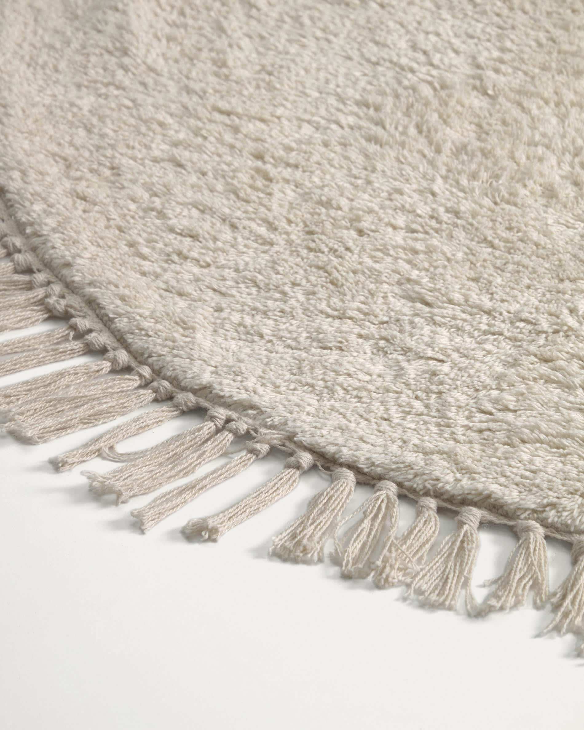 Orwen runder Teppich aus 100% Baumwolle, Ø 100 cm, stilvoll und nachhaltig, perfekt für moderne und gemütliche Wohnräume.