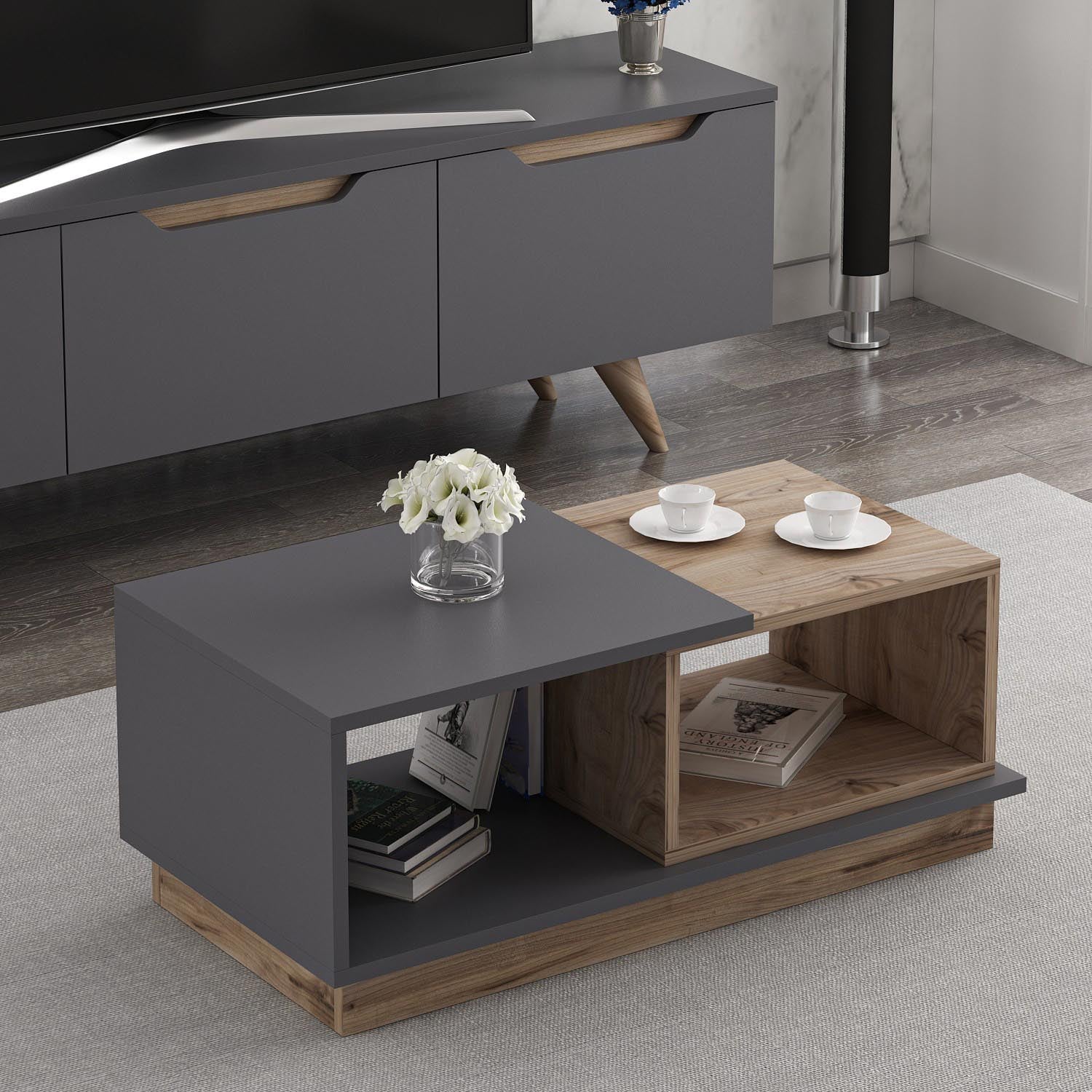 Erleben Sie den Consept Sofatisch in Anthrazit Eiche von Hanah Home – ein eleganter Tisch, der Stil und Funktionalität vereint und Ihr Wohnzimmer bereichert.