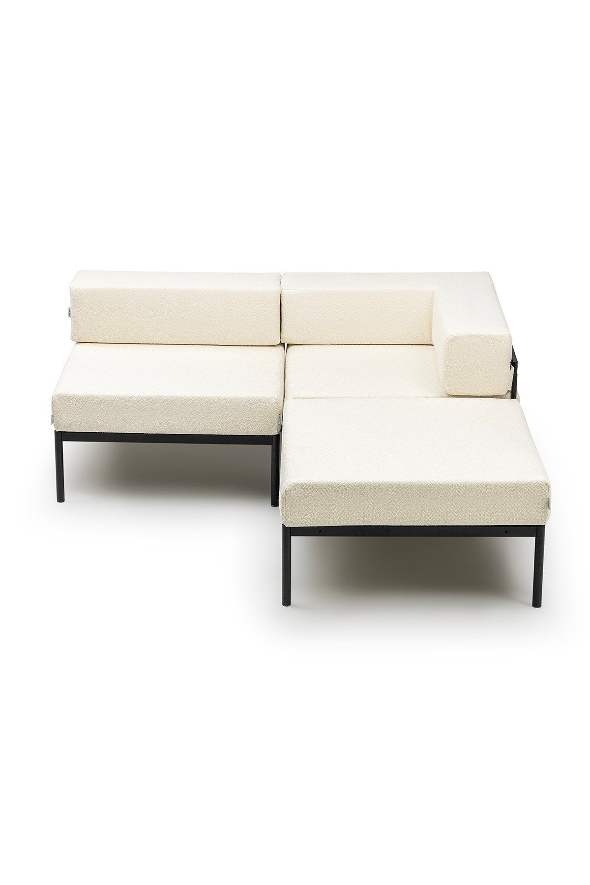 Ecksofa in Schwarz und Creme mit Bouclé-Stoff, Metallgestell und Metallbeinen, abnehmbare Sitzkissen, Grösse 180 x 180 cm.