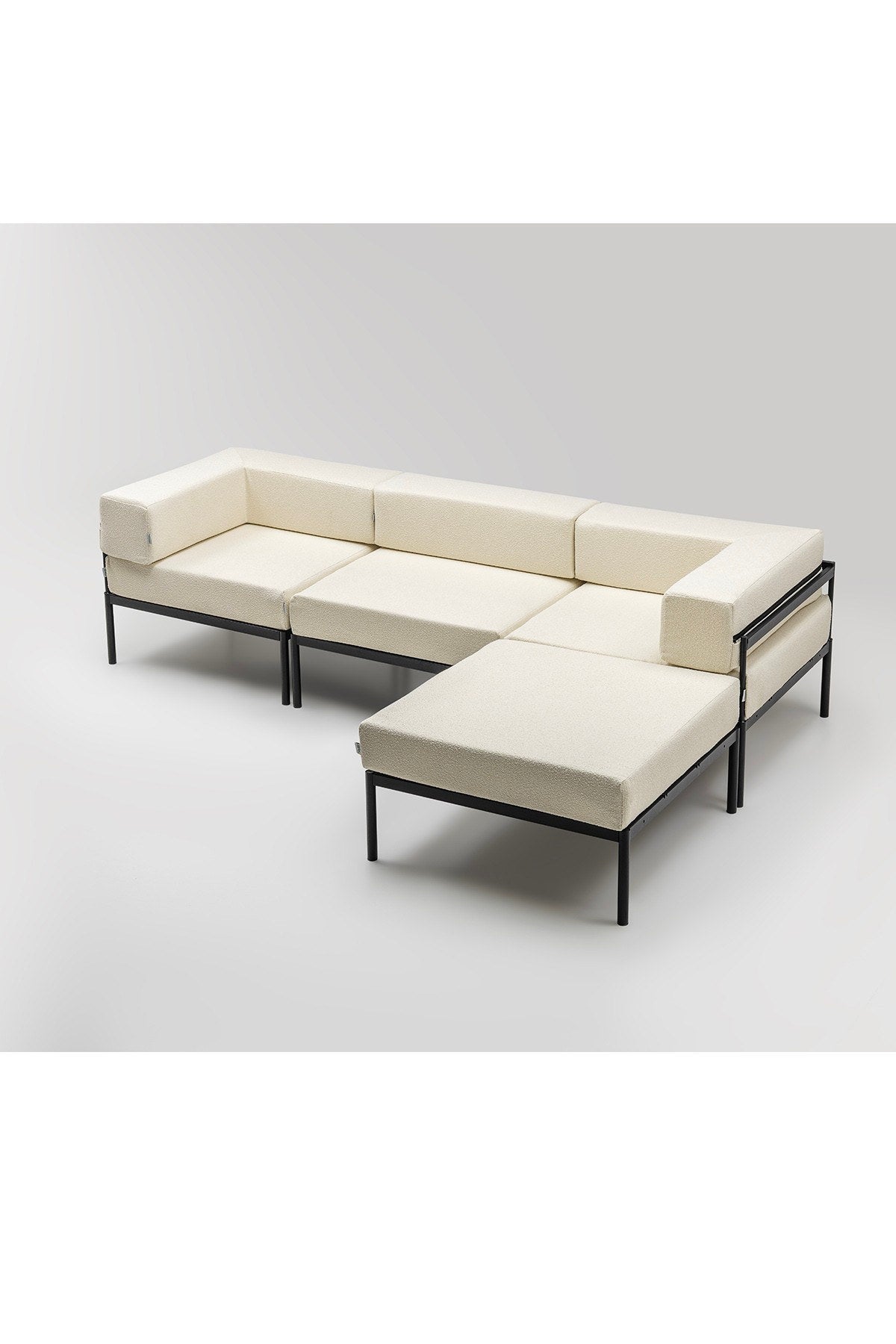 Ecksofa Corner Set 270 von Hanah Home in Schwarz und Creme, Bouclé-Stoffbezug, Metallbeine, verstellbare Rückenlehne und abnehmbare Sitzkissen.