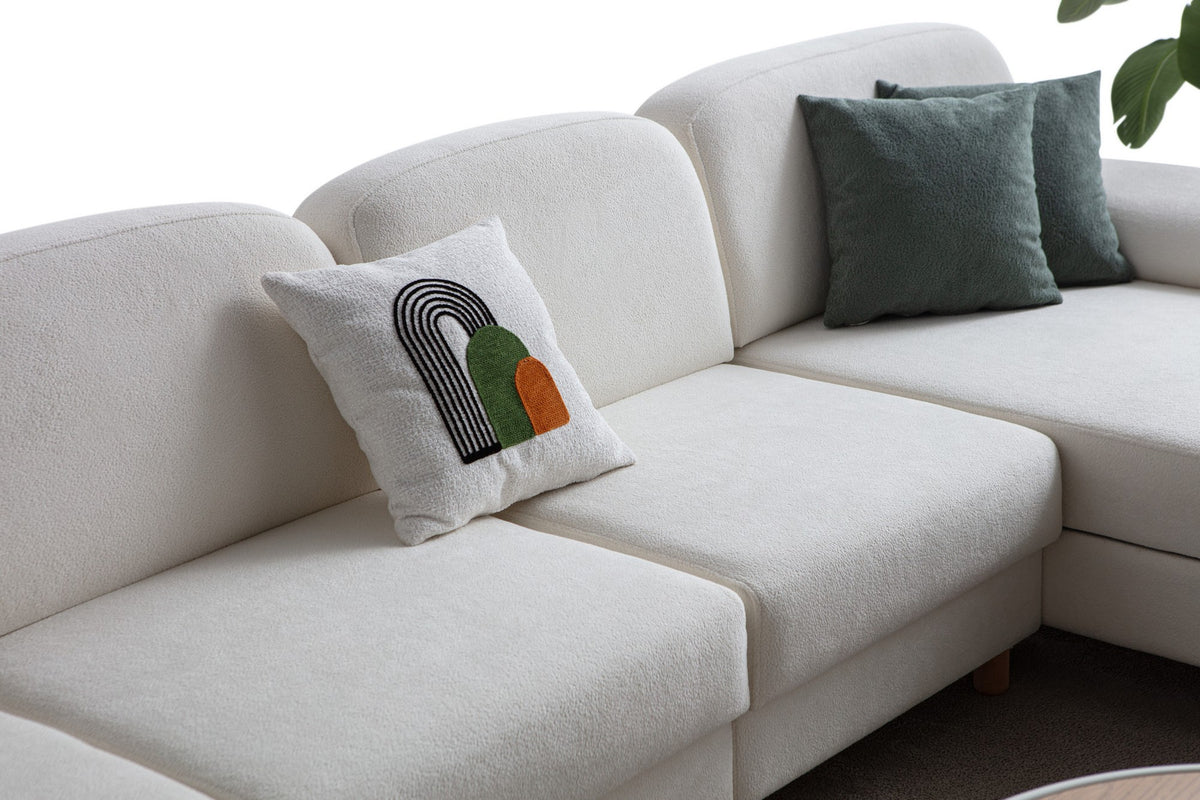 Weisses Eck-Schlafsofa Aries Relax Joker mit Coco-Boucle-Stoff, Holzbeinen und integrierter Aufbewahrungstruhe, rechte Ausführung, Ansicht von vorne.