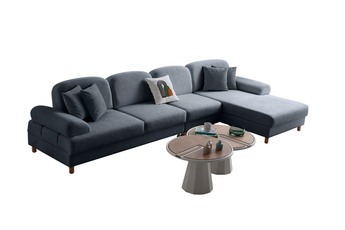 Marineblaues Eck-Schlafsofa Aries Relax Joker von Hanah Home mit Coco-Boucle-Stoffbezug, Holzbeinen und ausklappbarer Liegefläche.