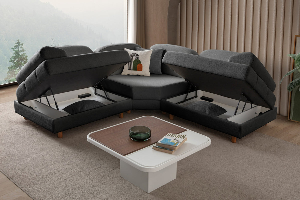 Anthrazitfarbenes Eck-Schlafsofa mit Coco-Boucle-Stoff, Holzbeinen und vier Kissen, teilweise als Liegefläche ausgeklappt dargestellt.