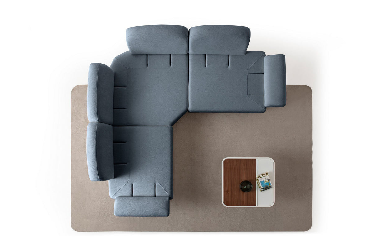 Marineblaues Eck-Schlafsofa Aries Modular S von Hanah Home mit Coco-Boucle-Stoff, Holzbeinen und integrierter Aufbewahrungsbox, aufgenommen im Wohnraum