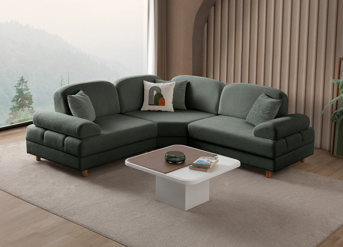 Grünes Eck-Schlafsofa Aries Modular S von Hanah Home mit Coco-Boucle-Stoffbezug, Holzbeinen und integrierter Truhe für Stauraum.