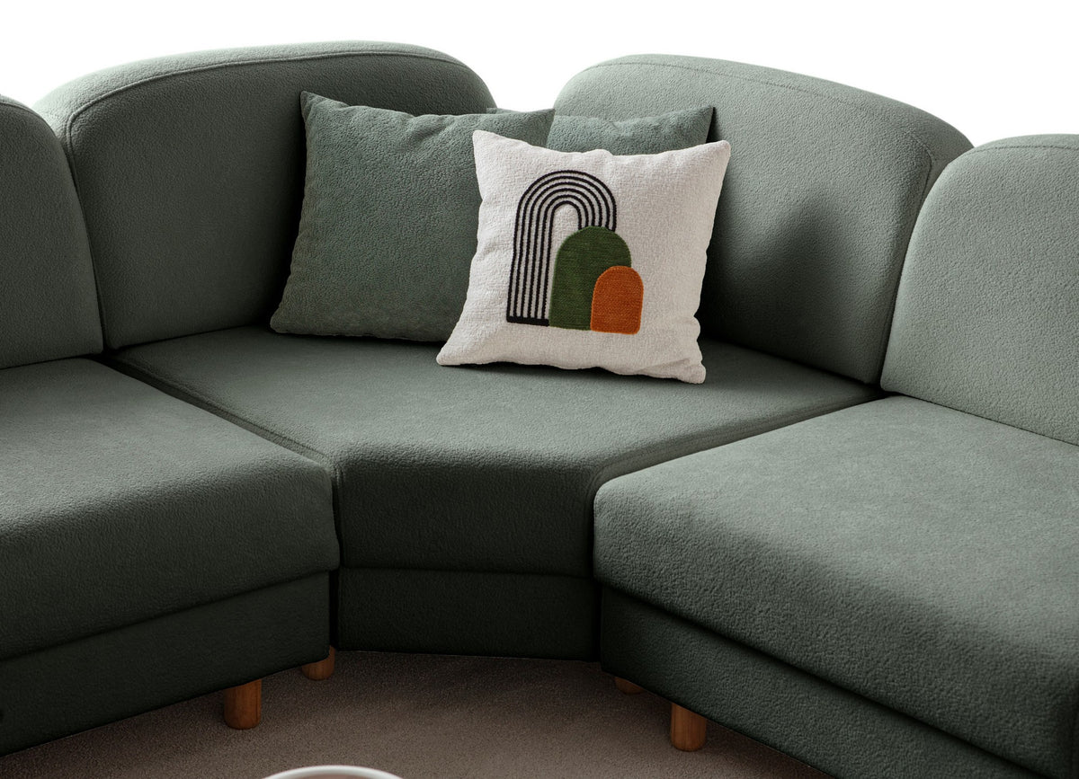 Grünes Eck-Schlafsofa Aries Modular S von Hanah Home mit Coco-Boucle-Stoffbezug, Holzbeinen und integrierter Truhe für Stauraum.