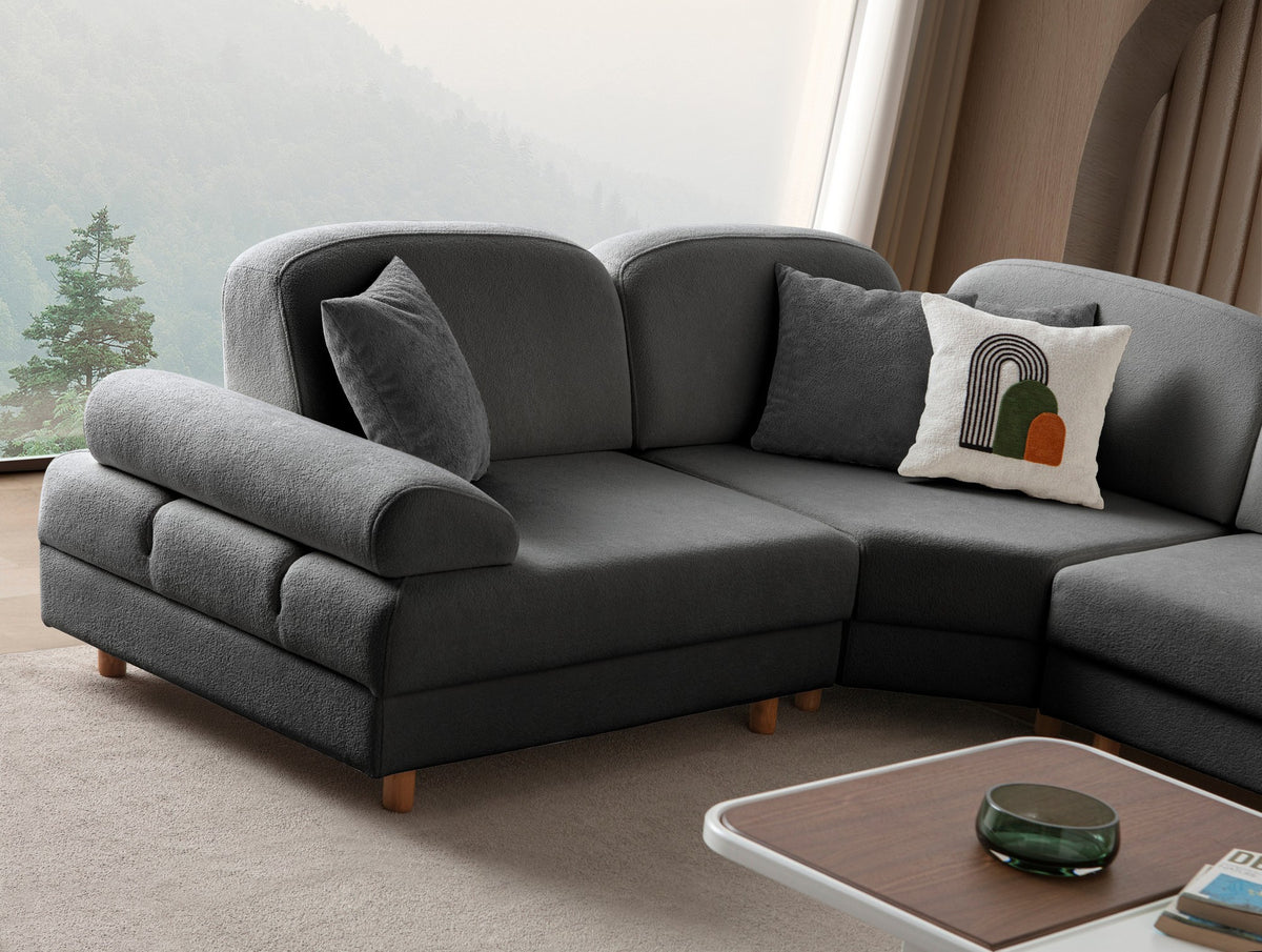 Anthrazitfarbenes Eck-Schlafsofa mit Boucle-Stoffbezug, Holzbeinen und Aufbewahrungstruhe, fotografiert in modularer L-Form.