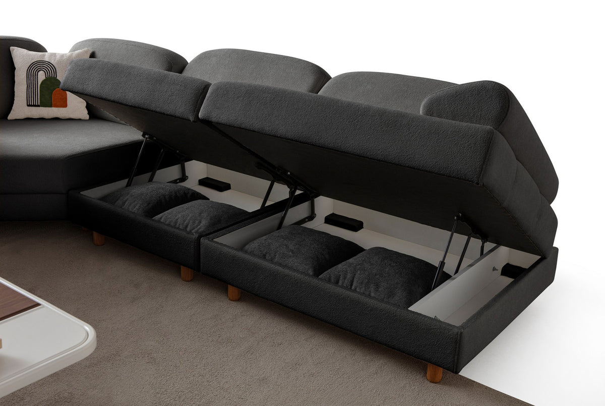 Anthrazitfarbenes Eck-Schlafsofa mit Boucle-Stoffbezug, Holzbeinen und Aufbewahrungstruhe, fotografiert in modularer L-Form.