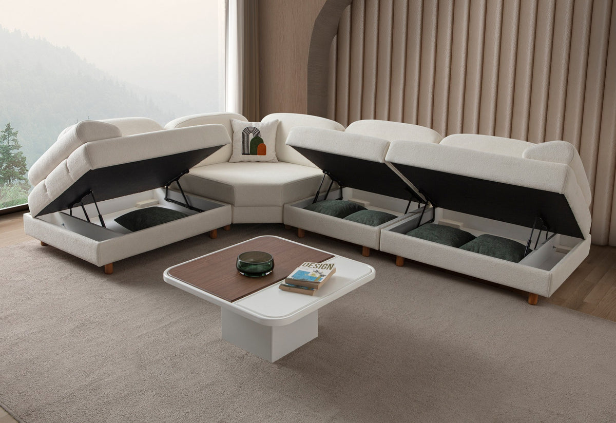 Weisses Eck-Schlafsofa Aries Modular M von Hanah Home mit Coco-Boucle-Stoff, Holzbeinen und Aufbewahrungstruhe, in L-Form.