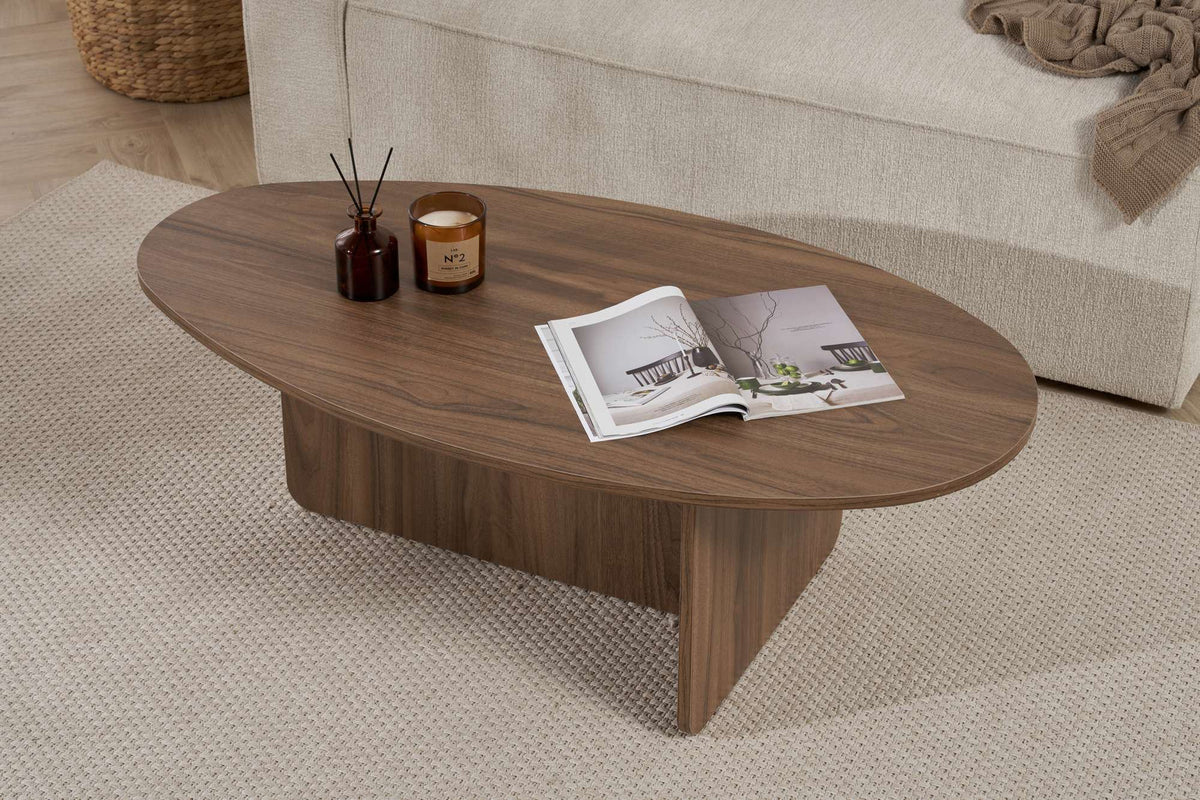 Foto eines rechteckigen Couchtischs in Venezia-Nussbaum-Optik aus melaminbeschichteter Spanplatte mit schlichtem, geradlinigem Design.