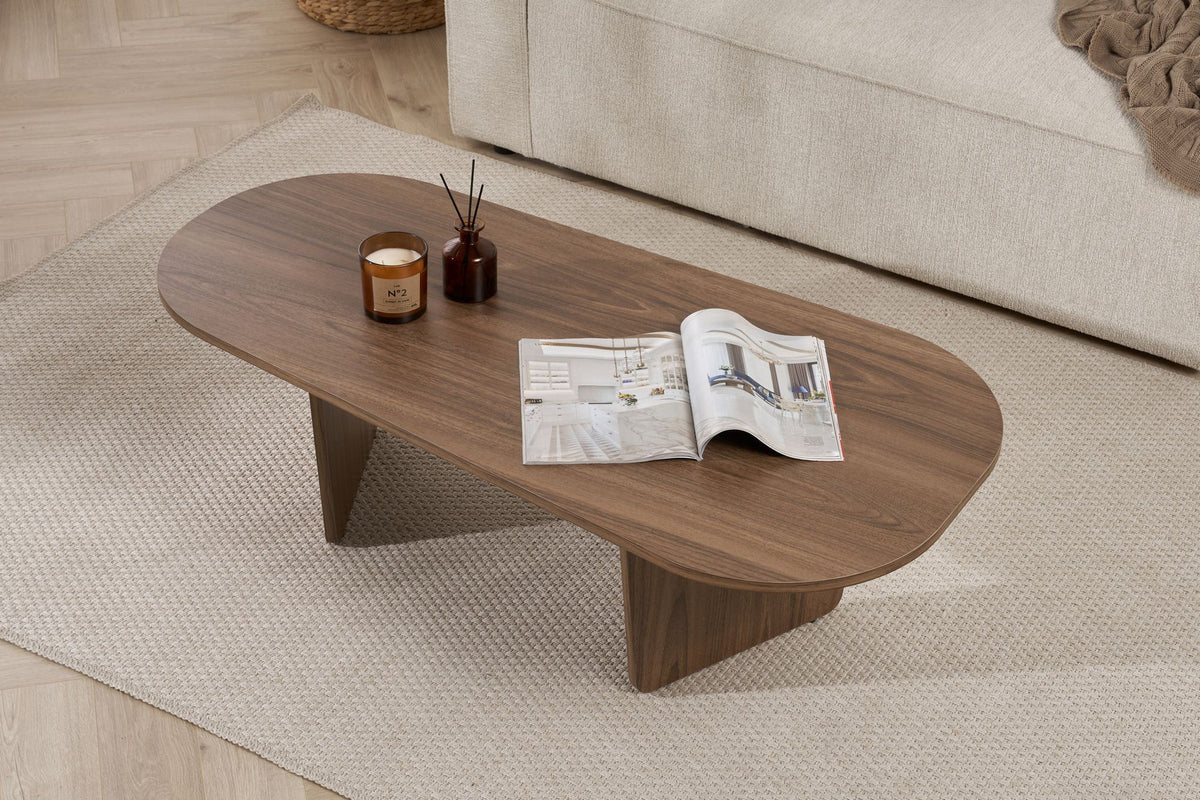 Ovaler Couchtisch in Nussbaumfarbe mit Melaminbeschichtung, Masse 130 x 65 x 40 cm, Modell Ovalis von Nordure.