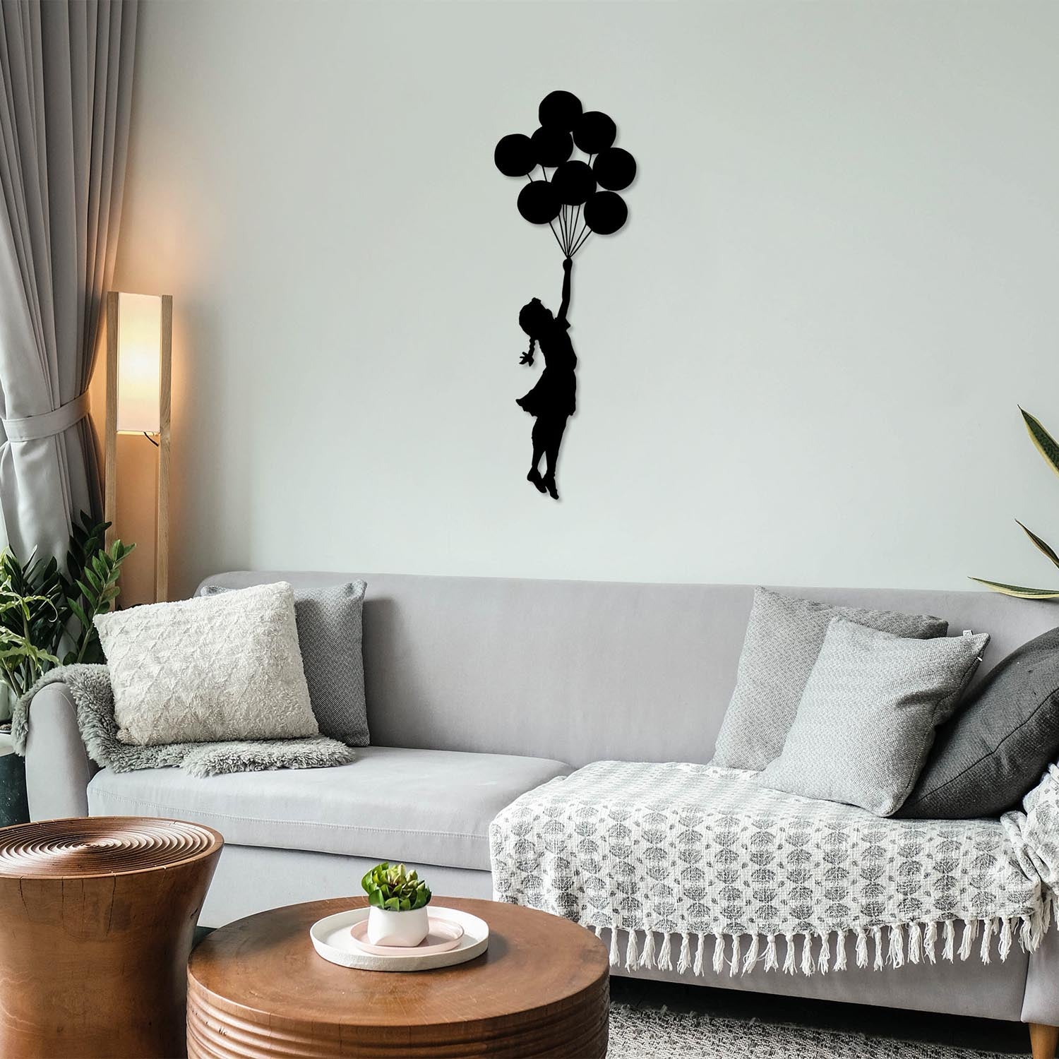 Banksy - 12 in Schwarz präsentiert im Onlineshop von KAQTU Design AG. Wanddeko ist von Wallity
