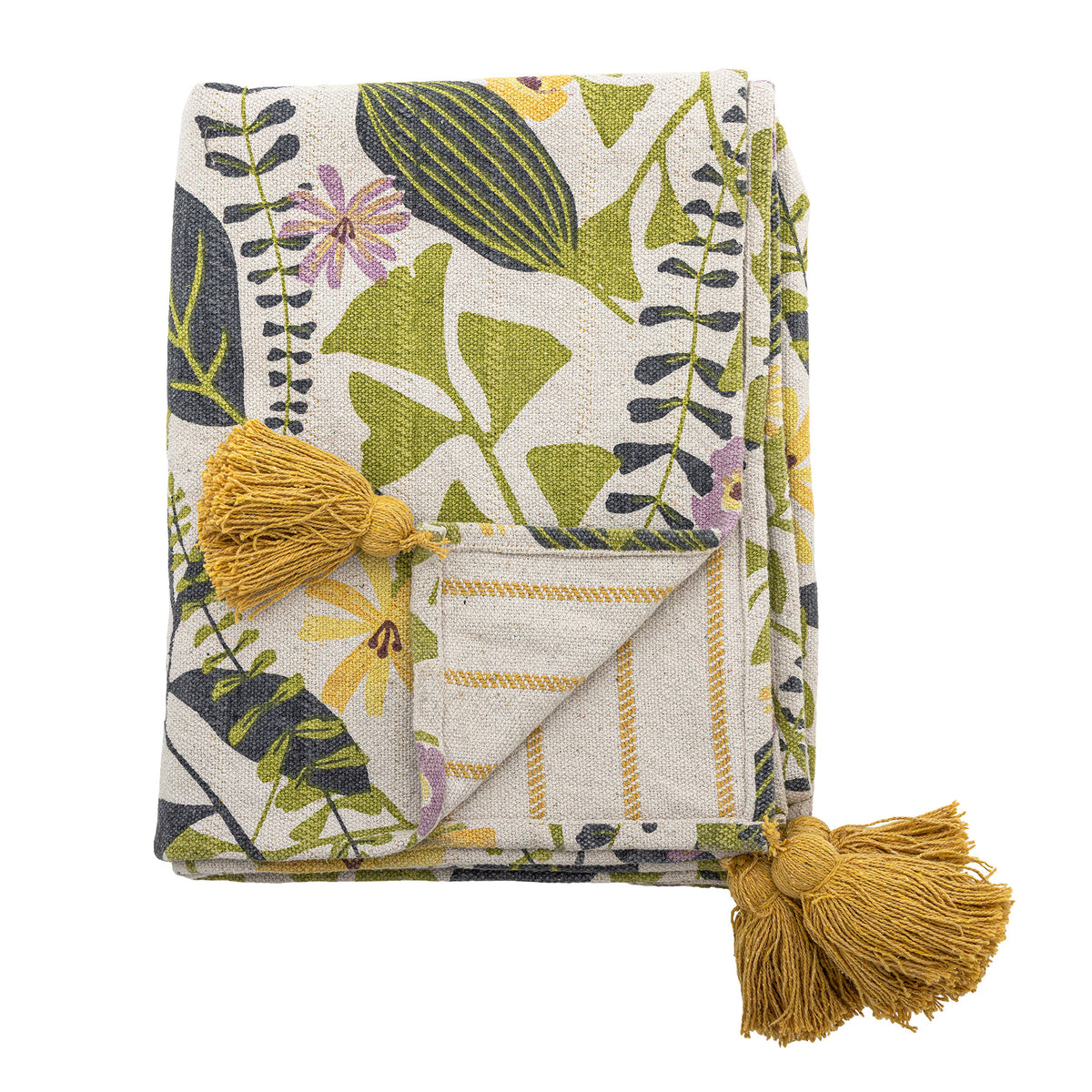 Wolldecke Camelie von Creative Collection in Bunt mit botanischem Blätter- und Blumenmuster, gewebt und bedruckt, mit gelben Quasten an den Ecken.