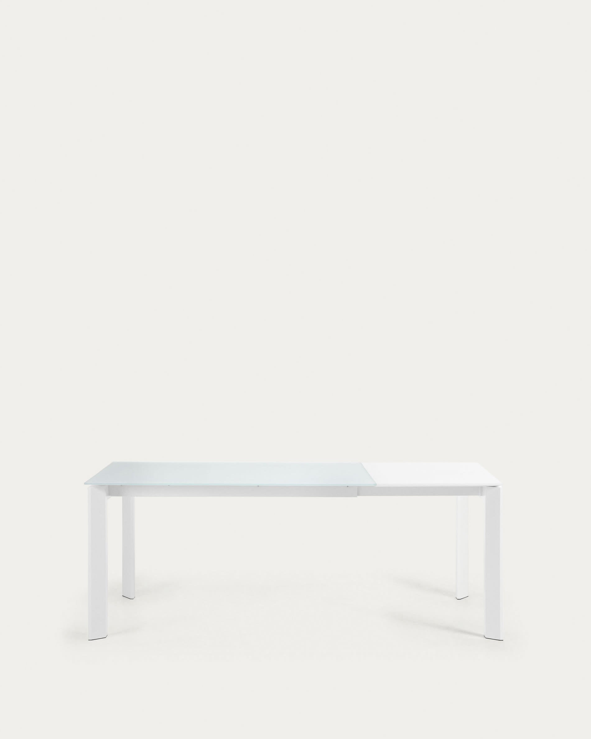 Eleganter Axis Ausziehtisch mit weißer Glasplatte und Stahlbeinen, ausziehbar von 140 auf 200 cm, perfekt für moderne Wohnräume.