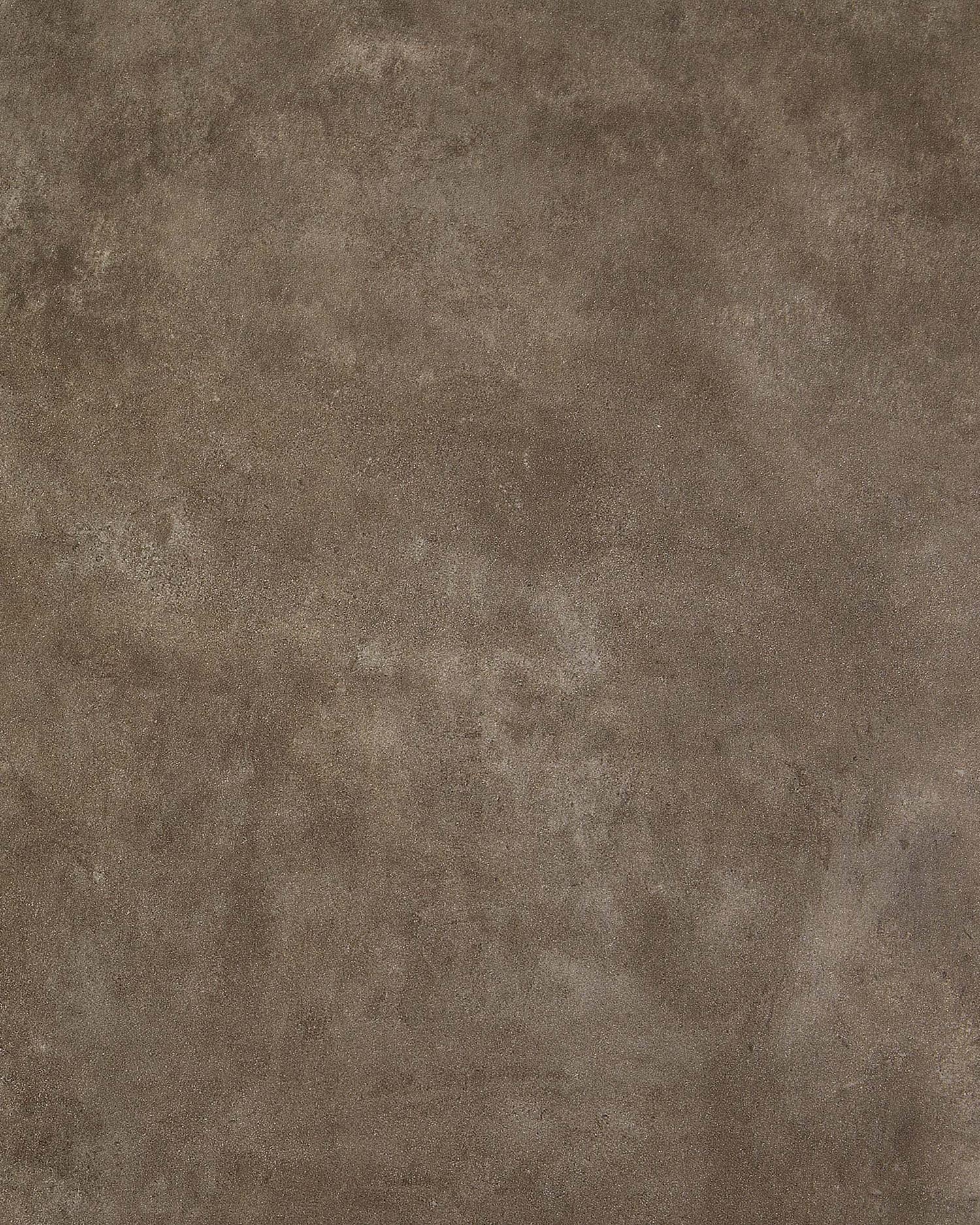 Eleganter Ausziehtisch mit Feinsteinzeugplatte in Vulcano Ceniza Optik und weißen Stahlbeinen, ausziehbar von 140 auf 200 cm.