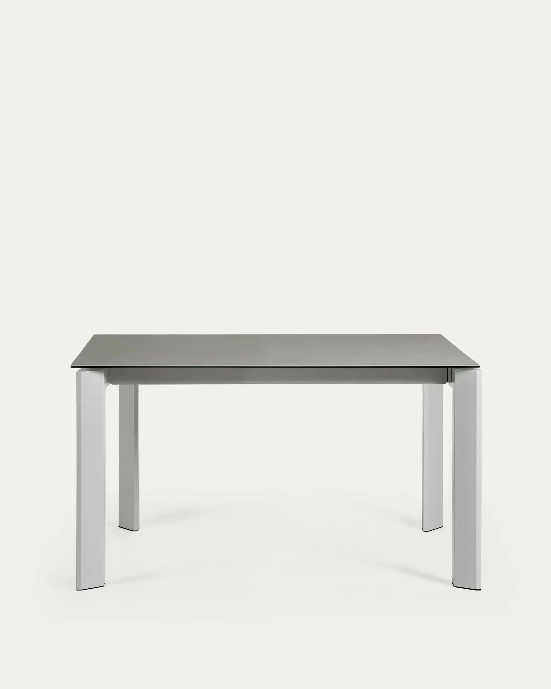 Moderner Ausziehtisch mit grauem Feinsteinzeug und Stahlbeinen, erweiterbar von 140 auf 200 cm, ideal für stilvolle Anlässe.