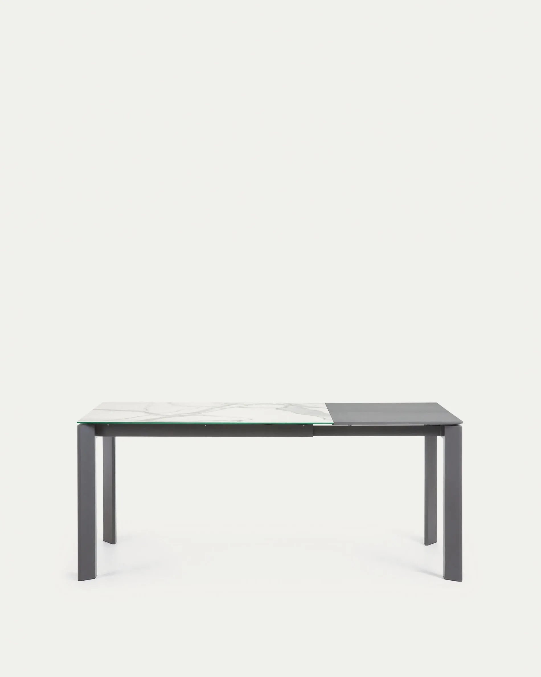 Eleganter Ausziehtisch mit Kalos Weißer Feinsteinzeugplatte und dunkelgrauen Beinen, erweiterbar von 120 auf 180 cm.
