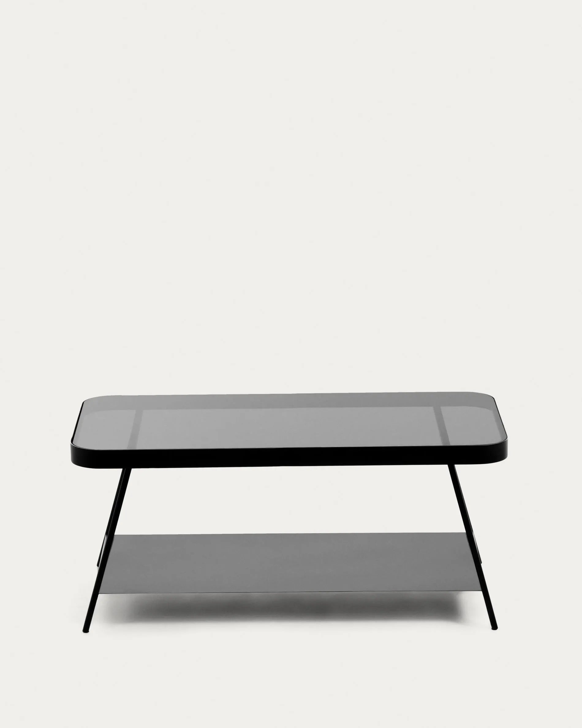 Eleganter Couchtisch mit rauchgrauem Glas und schwarzem Stahl, 90x45 cm, ideal für stilvolle Wohnzimmer.