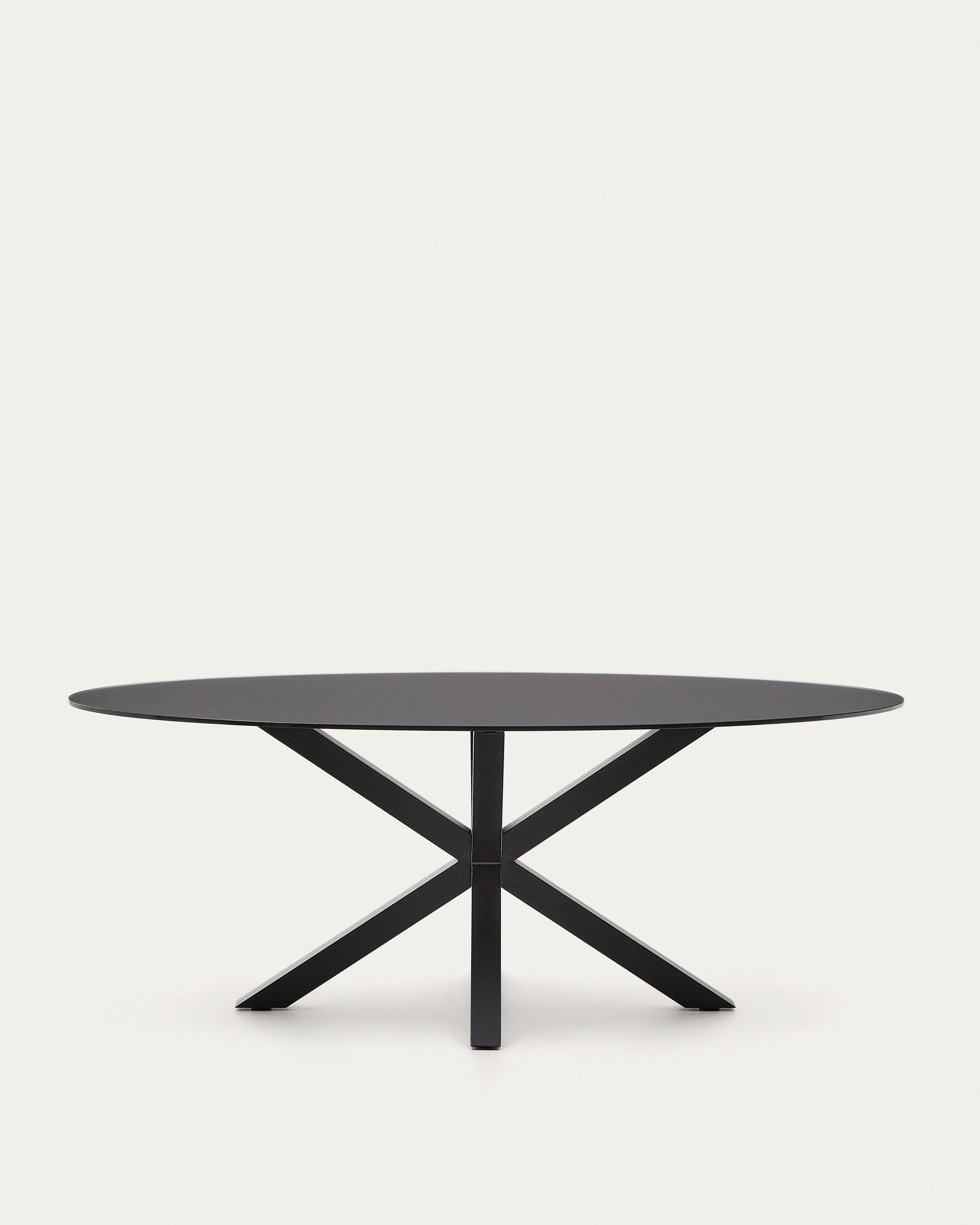 Argo table made of transparent glass with black steel legs Ø 200 x 100 cm