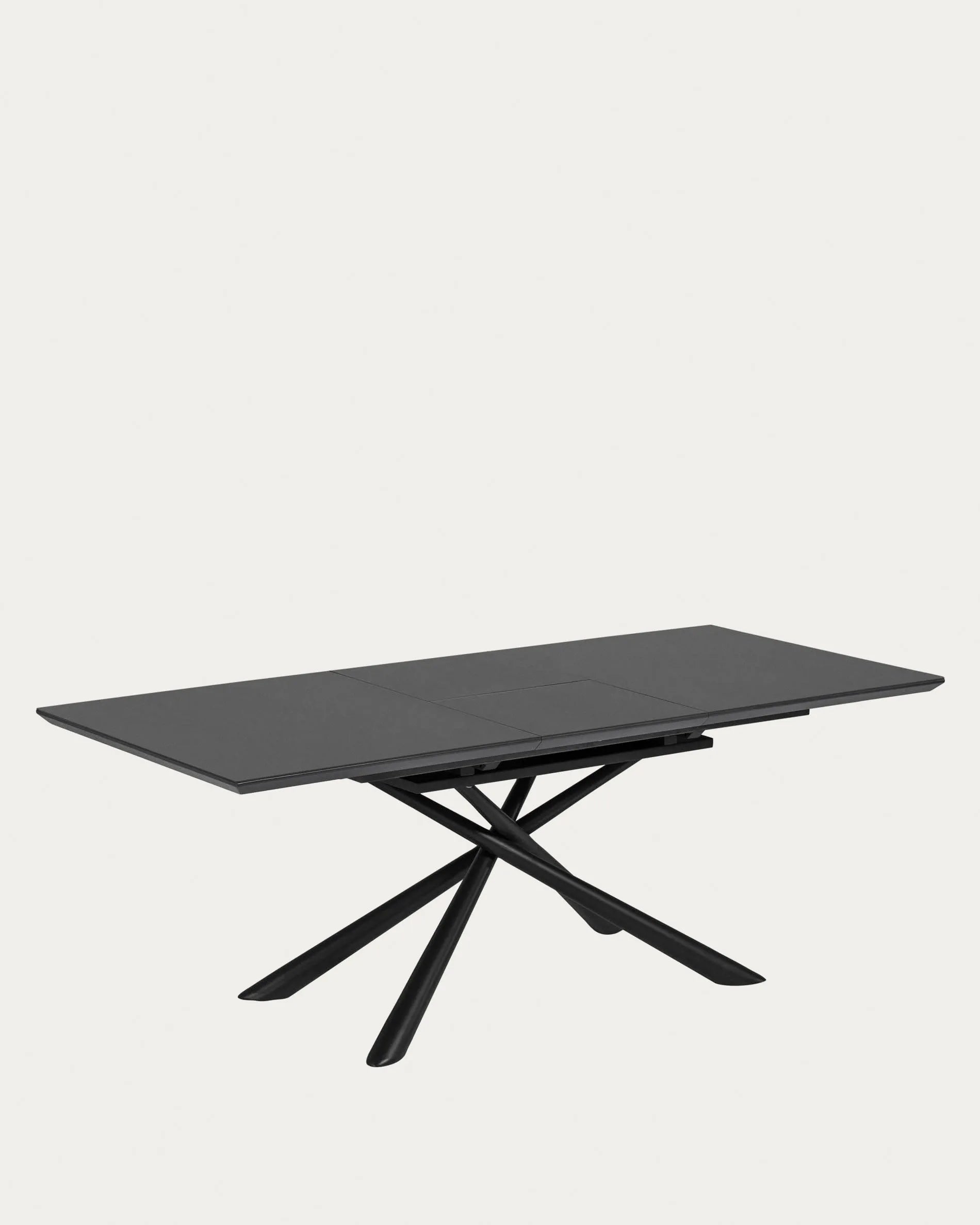 Moderner Ausziehtisch mit Glasplatte und schwarzen Stahlbeinen, ideal für stilvolle Esszimmer, Maße 160-210 x 90 cm.