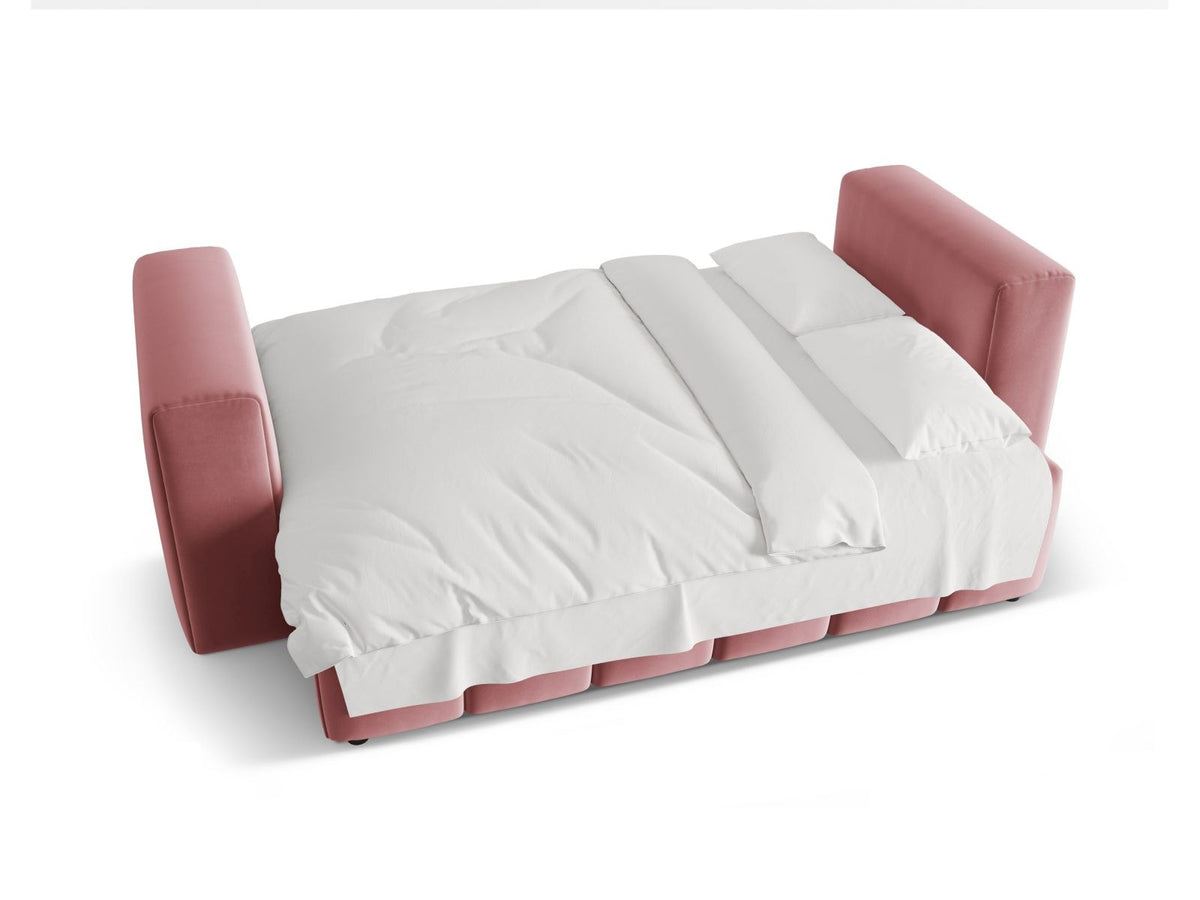 Sandfarbenes Samt-Bettsofa Verona mit drei Sitzplätzen, ausklappbarer Liegefläche, Bettkasten und schwarzen Kunststoffbeinen im Wohnraum.