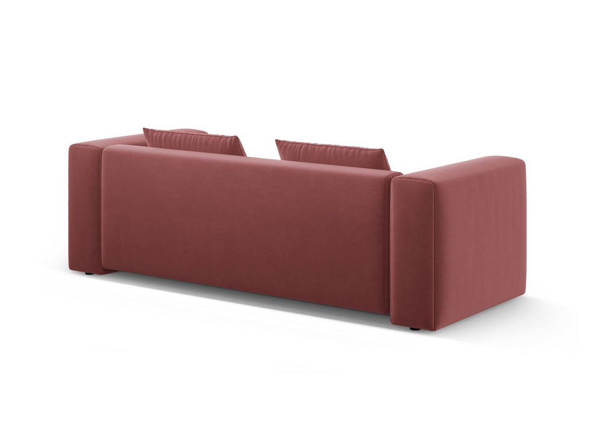 Sandfarbenes Samt-Bettsofa Verona mit drei Sitzplätzen, ausklappbarer Liegefläche, Bettkasten und schwarzen Kunststoffbeinen im Wohnraum.