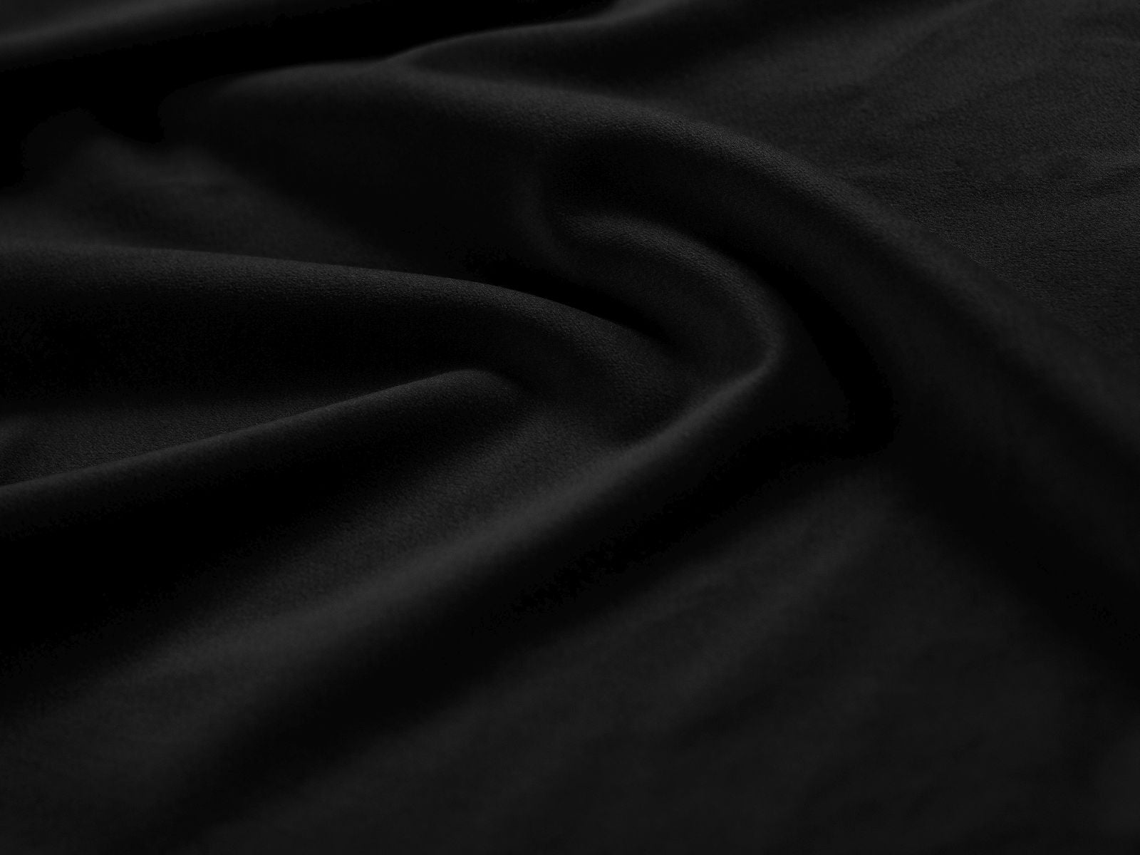 Elegantes Asti Bett mit 90 cm Kopfteil und praktischem Stauraum, gepolstert in edlem Black-Magic Velvet für ein modernes Schlafzimmer.