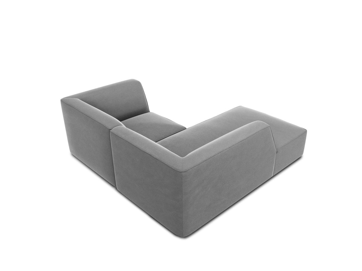 Modulares Ecksofa in Beige-Samt mit Récamiere links, Massivholzrahmen, schwarzen Kunststoffbeinen und weicher Samtpolsterung.