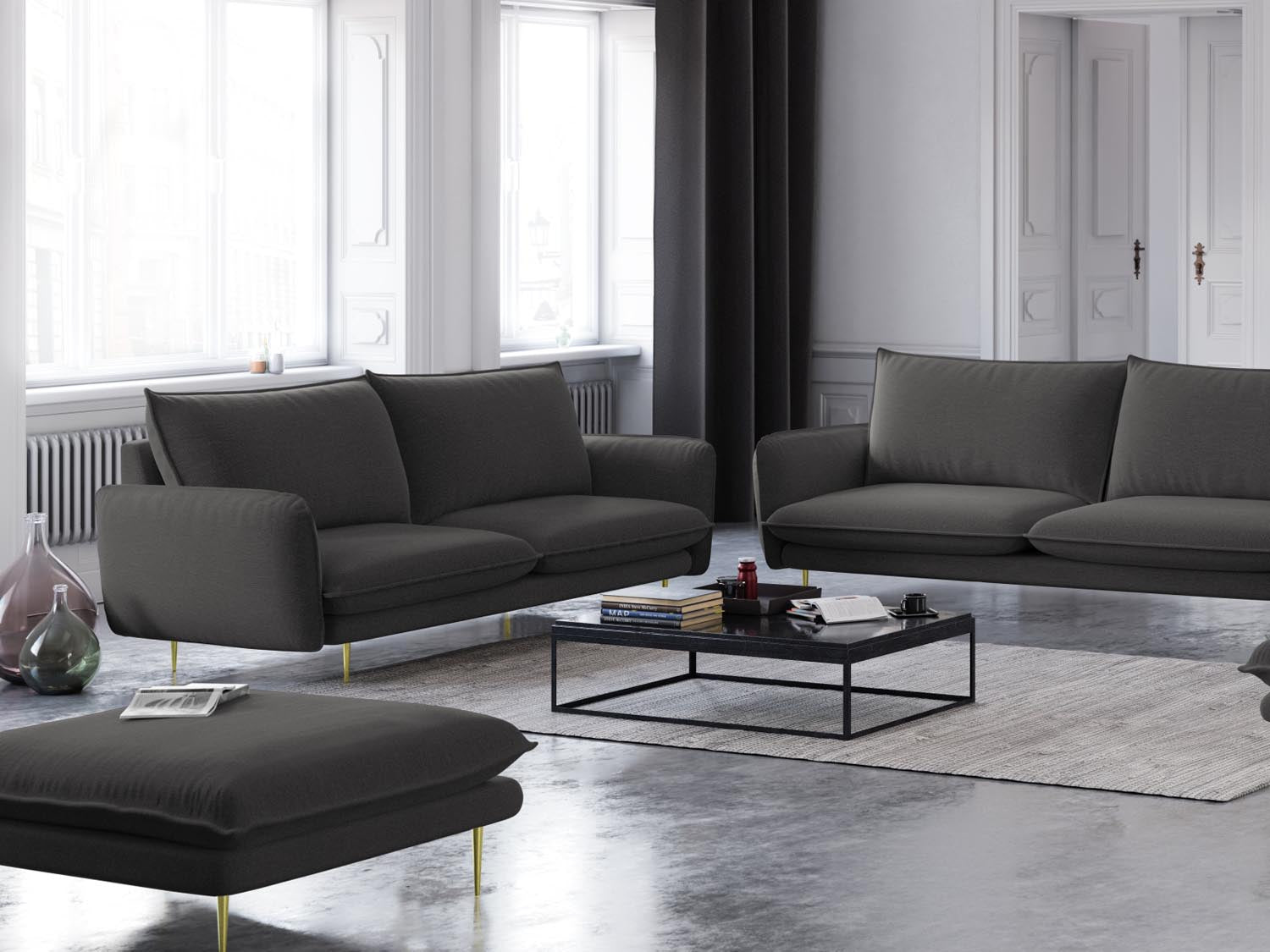 Eleganter Vienna Pouf in Dunkelgrau mit goldenen Akzenten, ideal für stilvolle Wohnräume und gemütliche Sitzgelegenheiten.