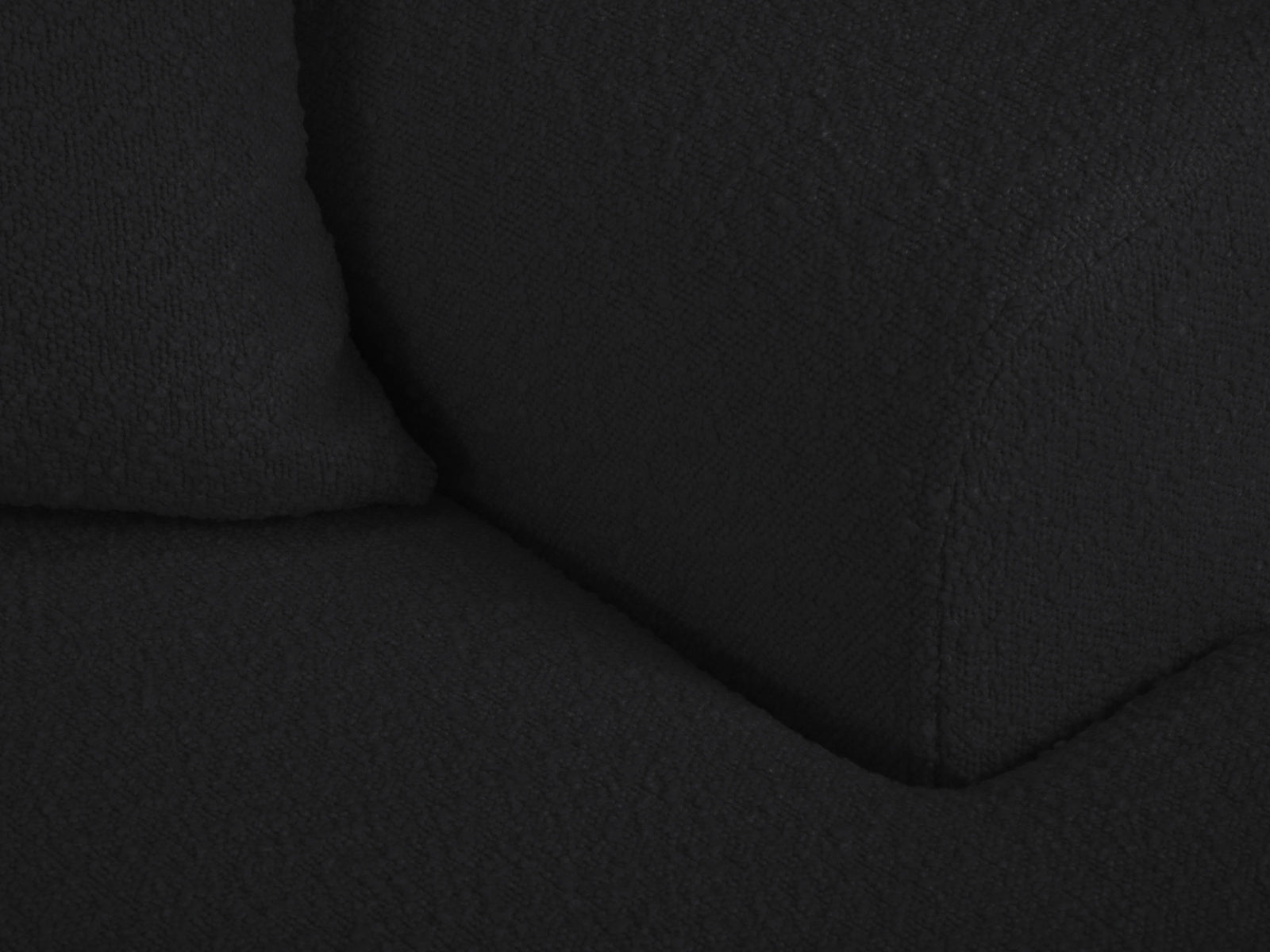 Stylisches Kyoto Boucle Ecksofa in elegantem Schwarz, 4-Sitzer mit praktischer Schlaffunktion und integriertem Stauraum für vielseitige Nutzung.