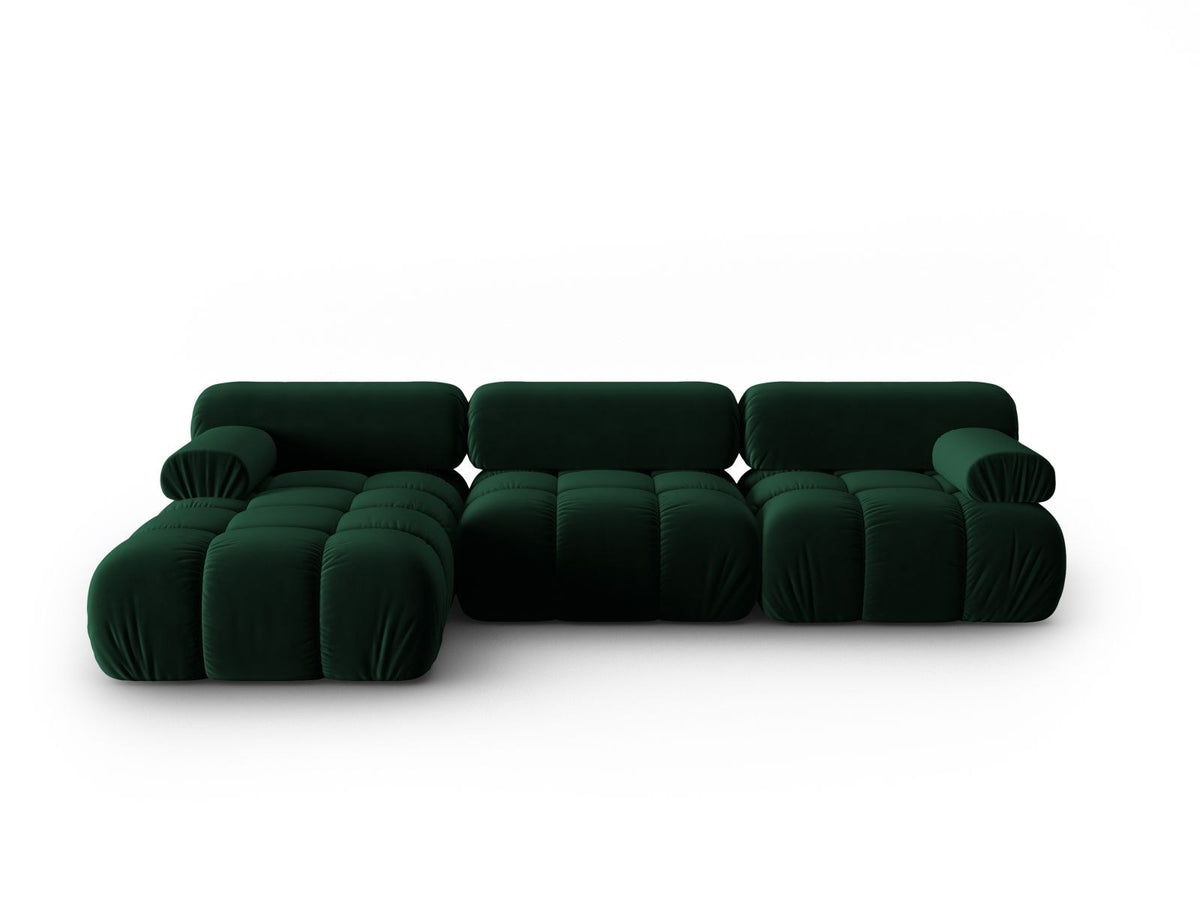 Modulares Ecksofa mit rosa Samtstoff, schwarzen Kunststoffbeinen und gepolsterter Récamiere, Ansicht von vorne links.