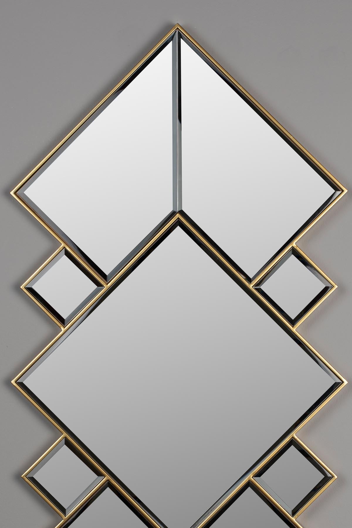 Spiegel Miyu in Gold präsentiert im Onlineshop von KAQTU Design AG. Wandspiegel ist von Dutchbone