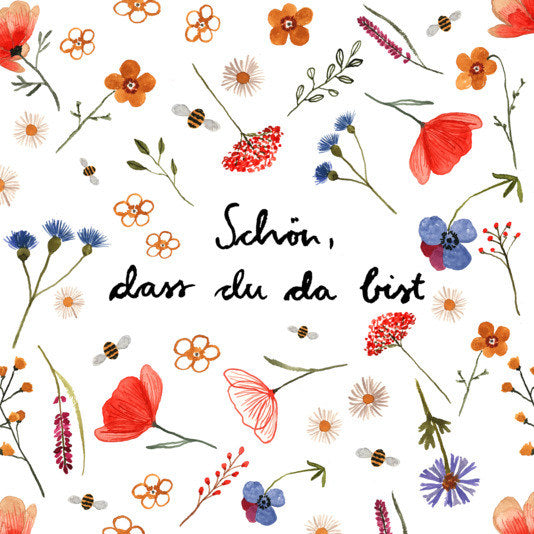 Weisse Papierserviette von PPD mit floralem Blumenmuster und Schriftzug «Schön, dass Du da bist», quadratisches Format, gefaltet dargestellt