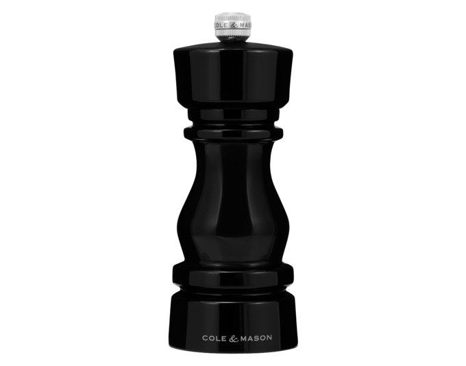 Schwarze Pfeffermühle London von COLE & MASON aus Acryl, 15 cm hoch, mit zylindrischer Form und einstellbarem Mahlwerk am oberen Ende.