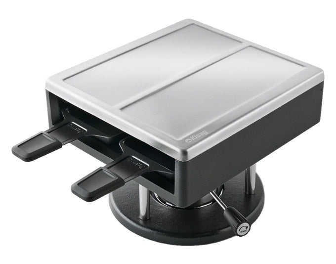 Raclette-Aufsatz SIERRE von KISAG aus Aluminium-Druckguss mit Edelstahldeckel, inklusive vier Pfännchen und Spachteln, Farben Schwarz und Silber.
