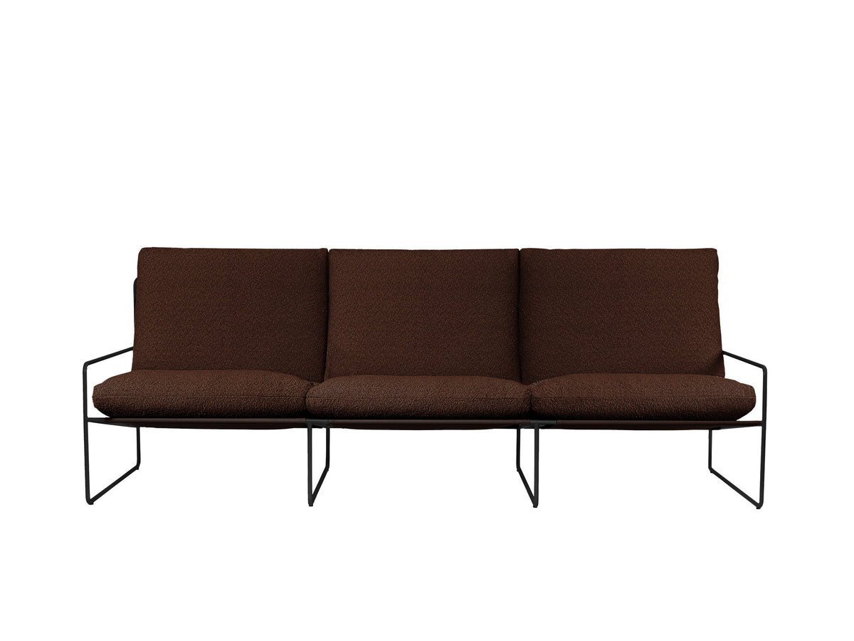 Desert 3-Sitzer Sofa von Ferm Living in Schwarz/Weiss, Bouclé-Bezug, Stahlrahmen mit Pulverbeschichtung, Outdoor-Lounge-Möbel im Garten.
