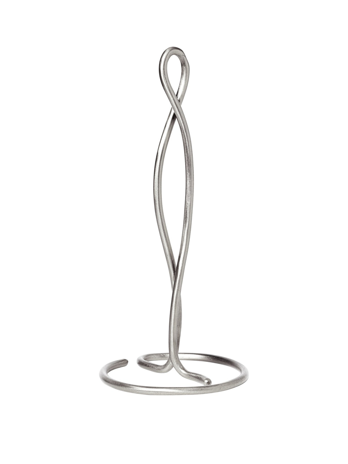 Curvature Papierrollenhalter von Ferm Living aus Edelstahl mit geschwungener Form, freistehend auf der Arbeitsplatte in der Küche.