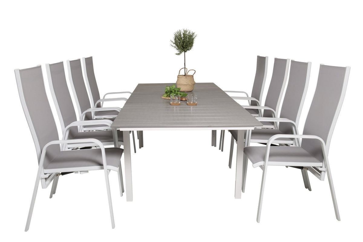 Graues Gartentischset aus Aintwood und Aluminium mit ausziehbarer Tischplatte und sechs klappbaren, pulverbeschichteten Stühlen im Aussenbereich.