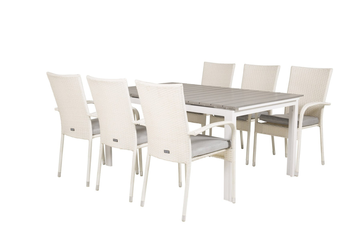 Weisser rechteckiger Gartentisch Levels mit grauer Aintwood-Tischplatte und zwei weisse Esszimmerstühle Anna aus Aintwood und Aluminium.