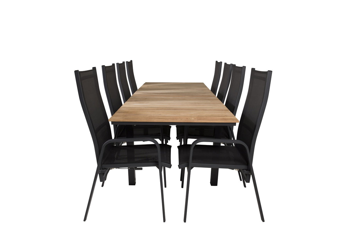 Zwei schwarze Relaxsessel Copacabana aus Aluminium mit Pulverbeschichtung neben rechteckigem Teak-Esstisch Mexico in Natur, Gartenmöbel-Set.