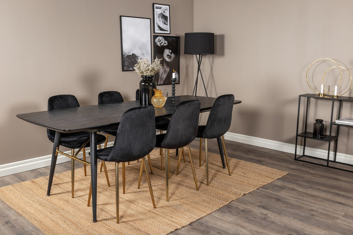 Rechteckiger Esstisch mit schwarzer MDF-Tischplatte und Stahlgestell, dazu zwei schwarze Esszimmerstühle mit gepolsterter Sitzfläche.